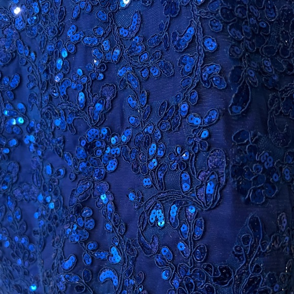 Sparkly blue prom dress with intricate details. - Picture 3 of 3